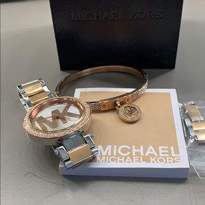 Rose gold watch with matching bracelet.